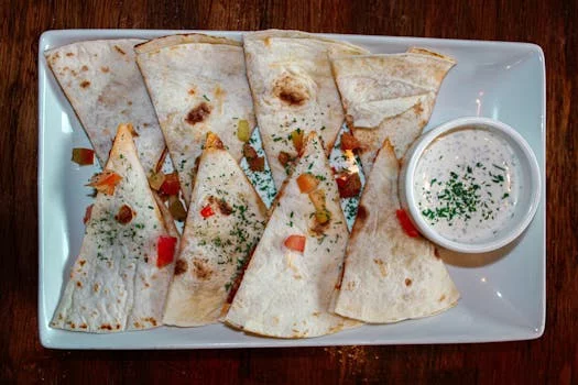 barbacoa beef quesadilla with cheese peppers