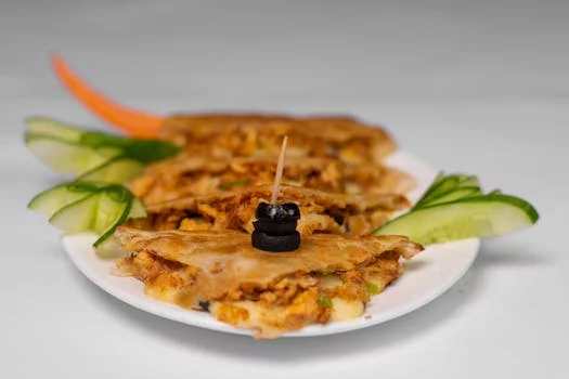 crispy quesadilla with cheese vegetables side salsa